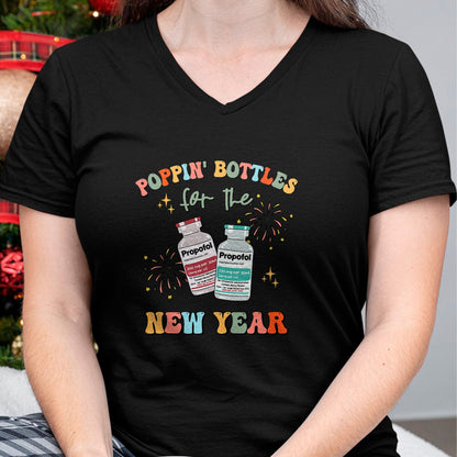 Funny Nurse Shirt, Nurse Unisex T-Shirt/Hoodie/Sweatshirt HLT00 -ICU Nurse New Year Eve Outfit Poppin Bottles ER RN CNA Nurse T-Shirt
