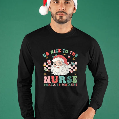 Funny Nurse Shirt, Nurse Unisex T-Shirt/Hoodie/Sweatshirt HLT00 - Nurse Christmas Shirt Be Nice To The Nurse Santa Is Watching T-Shirt